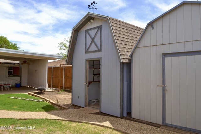200 Crescent Dr, Littlefield, TX 79339 - view of shed featuring fence