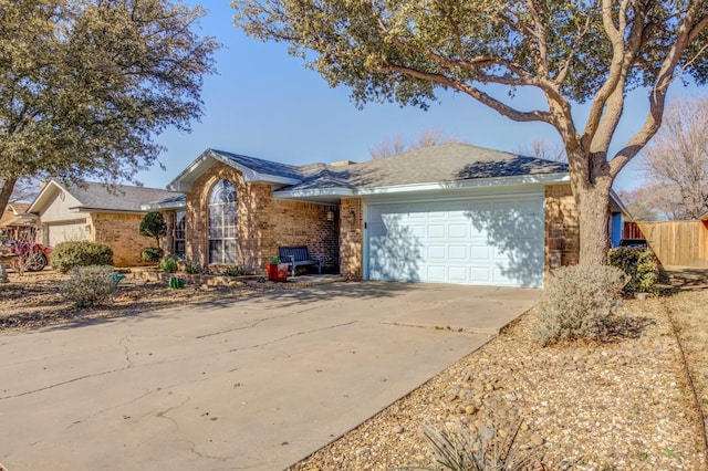 single story home featuring a garage