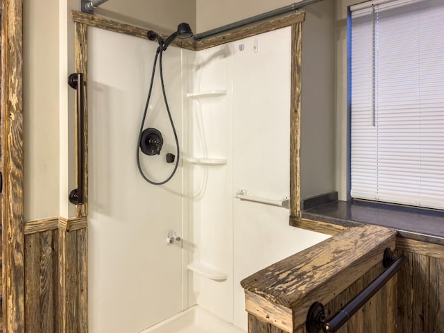 bathroom featuring walk in shower