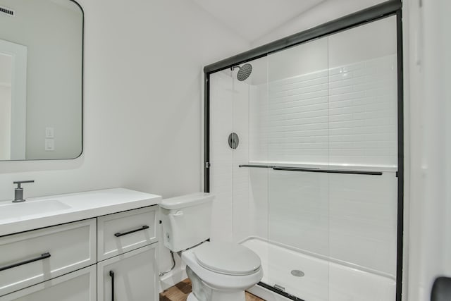 full bath featuring toilet, a stall shower, visible vents, and vanity