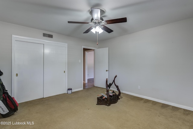 3413 42nd St, Lubbock, TX 79413 - unfurnished bedroom with carpet, baseboards, a closet, and a ceiling fan