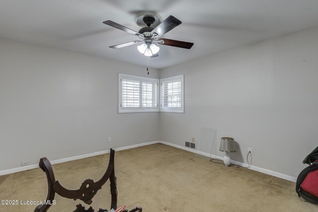 3413 42nd St, Lubbock, TX 79413 - workout room with carpet, baseboards, and a ceiling fan