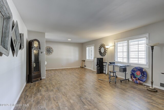 3413 42nd St, Lubbock, TX 79413 - office featuring wood finished floors, baseboards, and recessed lighting