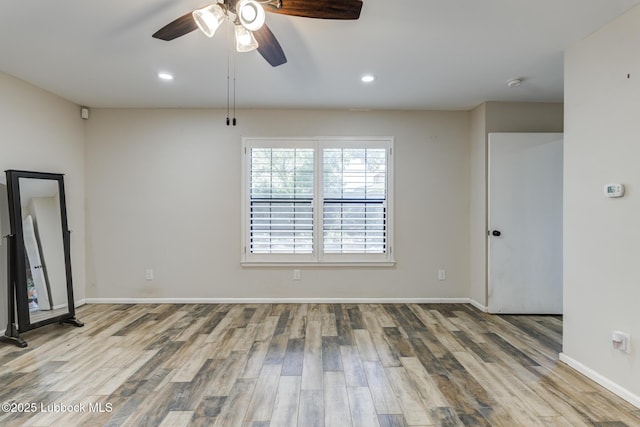 3413 42nd St, Lubbock, TX 79413 - unfurnished room with wood finished floors, ceiling fan, baseboards, recessed lighting, and a smoke detector