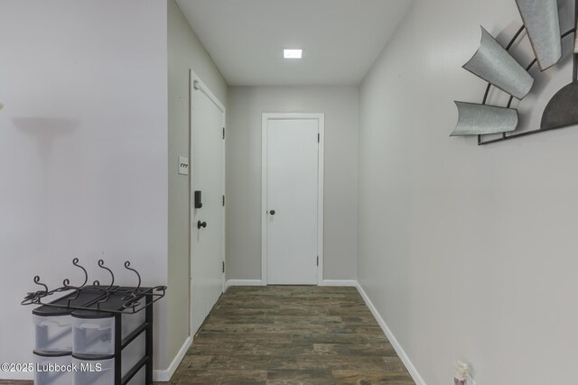 3413 42nd St, Lubbock, TX 79413 - hall featuring dark wood-type flooring and baseboards