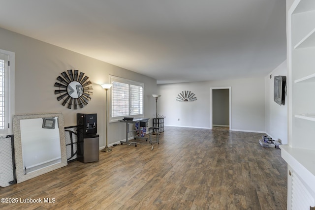 3413 42nd St, Lubbock, TX 79413 - living room featuring wood finished floors and baseboards