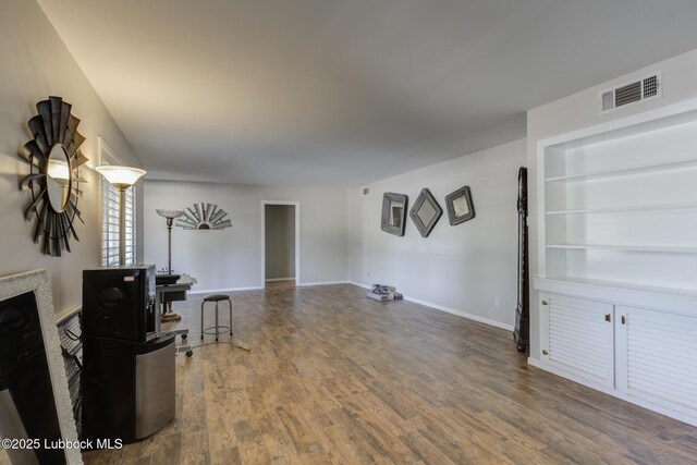 3413 42nd St, Lubbock, TX 79413 - living area with wood finished floors and baseboards