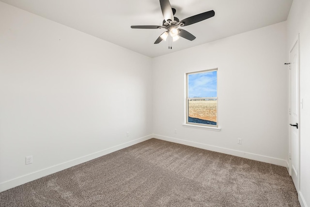 empty room featuring carpet floors and ceiling fan