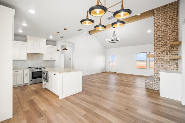 kitchen featuring stainless steel electric stove, built in microwave, beamed ceiling, white cabinets, and decorative backsplash