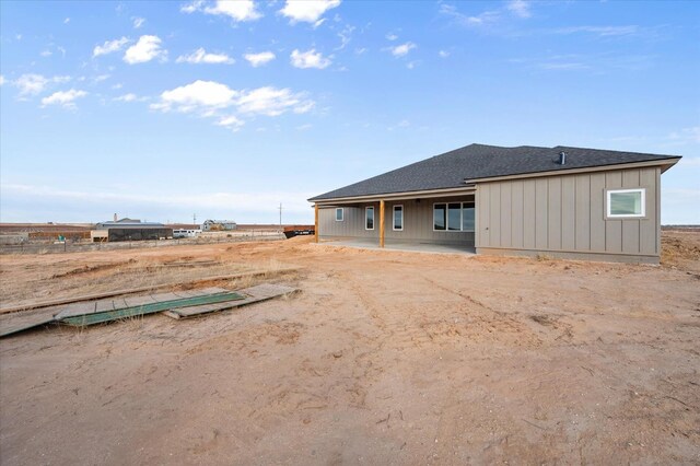 rear view of property with a patio area