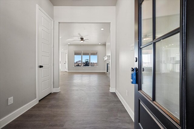 hallway featuring dark wood-type flooring