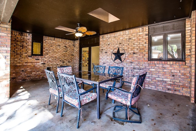 view of patio with ceiling fan