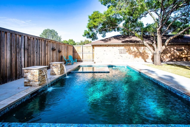 view of pool featuring a patio and pool water feature