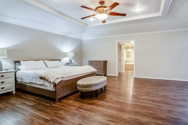 bedroom with a raised ceiling, crown molding, ceiling fan, and dark hardwood / wood-style flooring