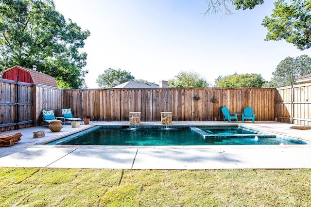 view of pool featuring a yard and a patio