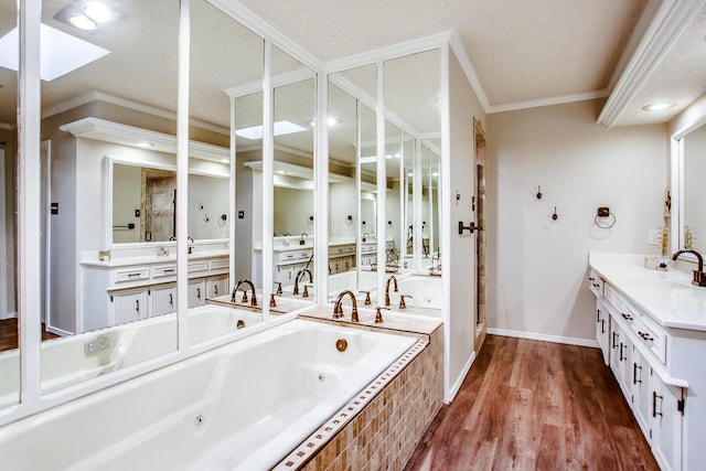 bathroom featuring crown molding, vanity, plus walk in shower, and hardwood / wood-style flooring