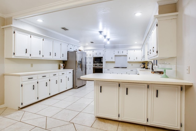 kitchen featuring sink, white cabinetry, ornamental molding, kitchen peninsula, and black appliances