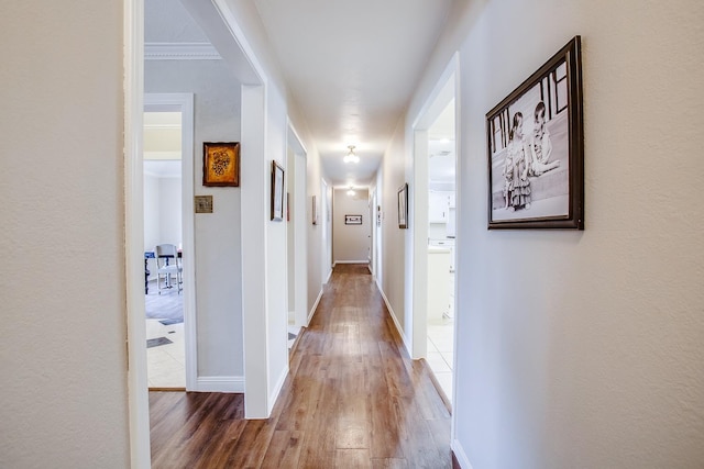 hallway featuring hardwood / wood-style floors