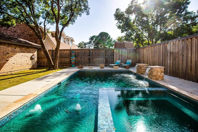 view of pool featuring pool water feature