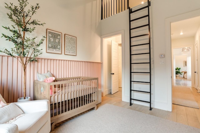 bedroom featuring light wood-type flooring