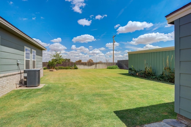 view of yard featuring central AC unit