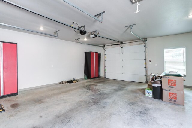 garage featuring a garage door opener