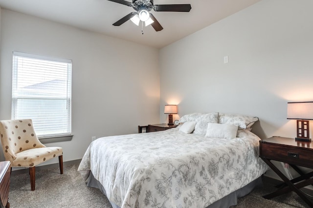 bedroom with multiple windows, carpet floors, and ceiling fan