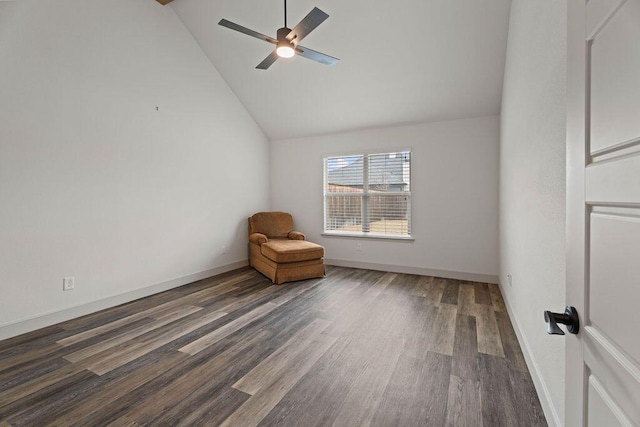 unfurnished room featuring a ceiling fan, high vaulted ceiling, baseboards, and wood finished floors