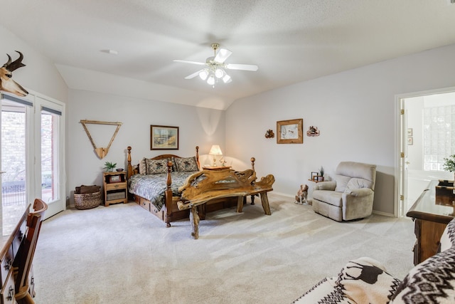 6910 Freeport Ave, Lubbock, TX 79424 - bedroom with access to outside, vaulted ceiling, light carpet, ceiling fan, and baseboards