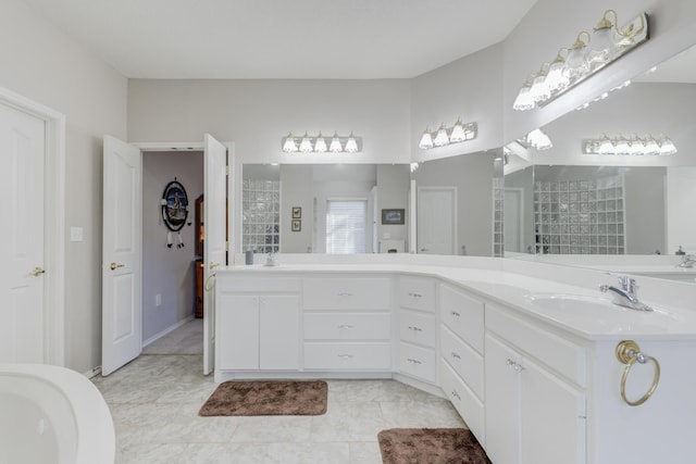 6910 Freeport Ave, Lubbock, TX 79424 - bathroom featuring tile patterned flooring and vanity