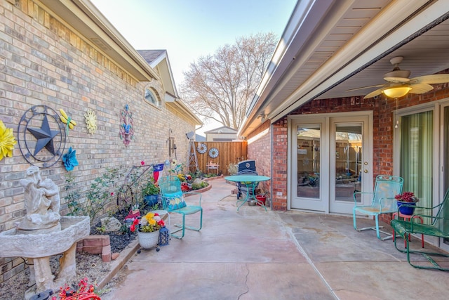 6910 Freeport Ave, Lubbock, TX 79424 - view of patio with fence, ceiling fan, and french doors