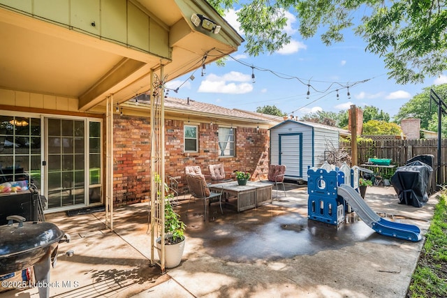 4411 58th St, Lubbock, TX 79414 - view of patio with a shed and outdoor dining area