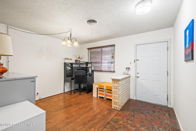 4411 58th St, Lubbock, TX 79414 - home office featuring a textured ceiling and a chandelier