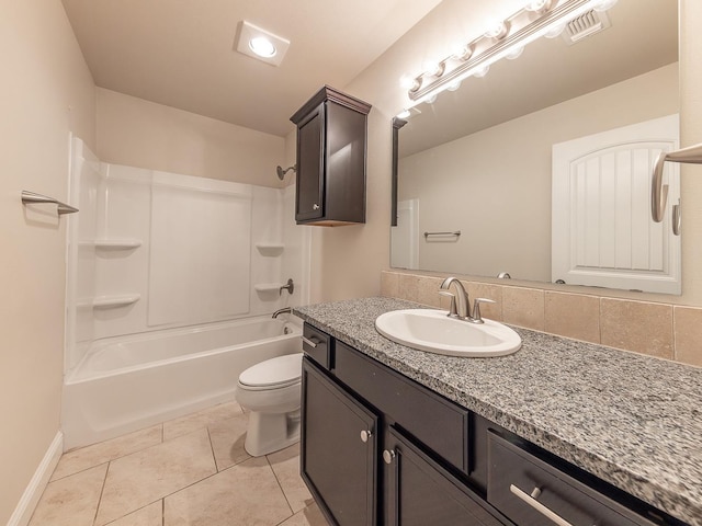 full bathroom with vanity, tile patterned floors, toilet, and shower / bath combination