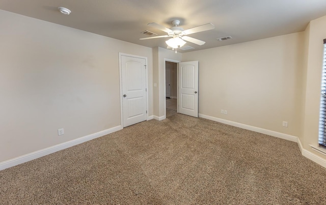 unfurnished bedroom featuring ceiling fan and carpet flooring