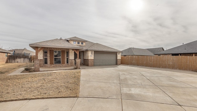 prairie-style home featuring a garage