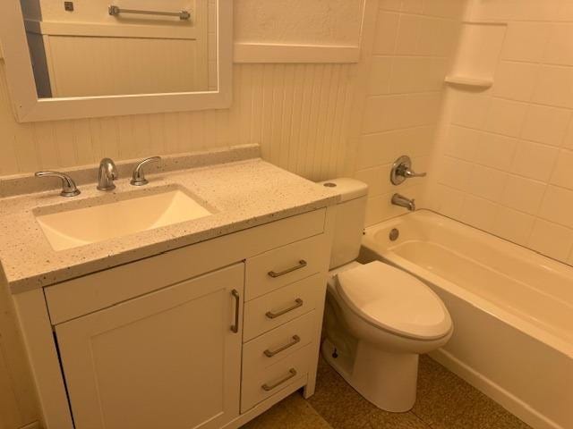 full bathroom with shower / bathtub combination, vanity, and toilet