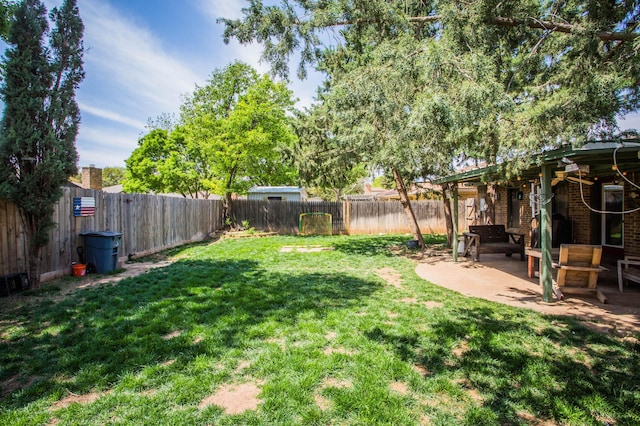view of yard featuring a fenced backyard and a patio