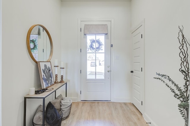 foyer with light hardwood / wood-style floors