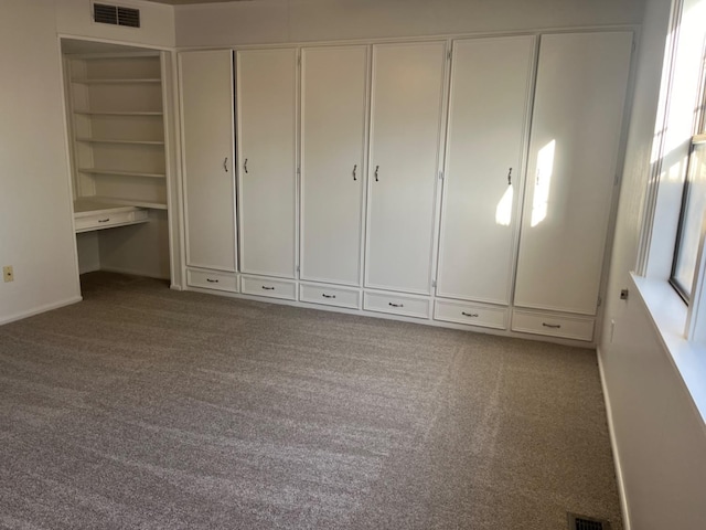 unfurnished bedroom featuring carpet floors