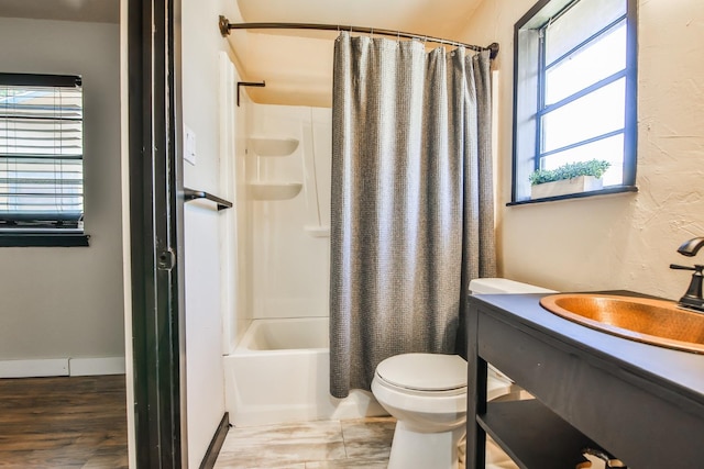 full bathroom with shower / bath combination with curtain, vanity, toilet, and hardwood / wood-style floors