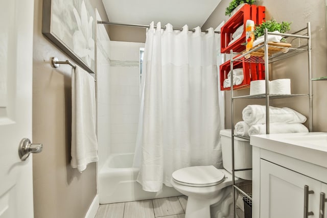 full bathroom with vanity, toilet, and shower / bath combo with shower curtain