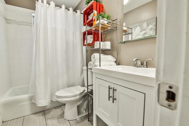 full bathroom featuring vanity, toilet, and shower / bath combo