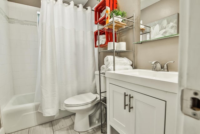 full bathroom with vanity, toilet, and shower / bath combo with shower curtain