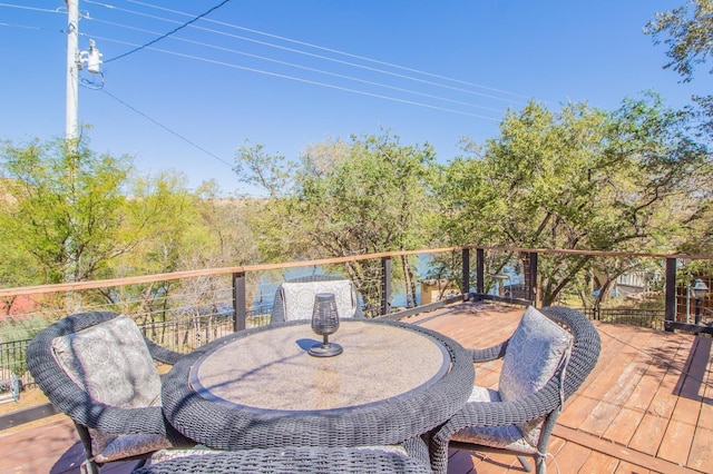 view of patio with a water view