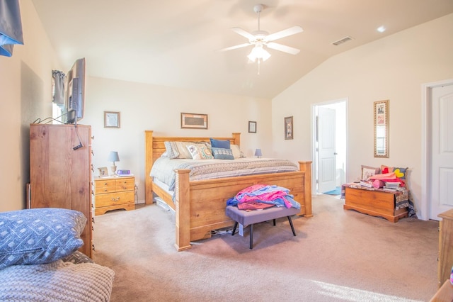 carpeted bedroom featuring vaulted ceiling and ceiling fan