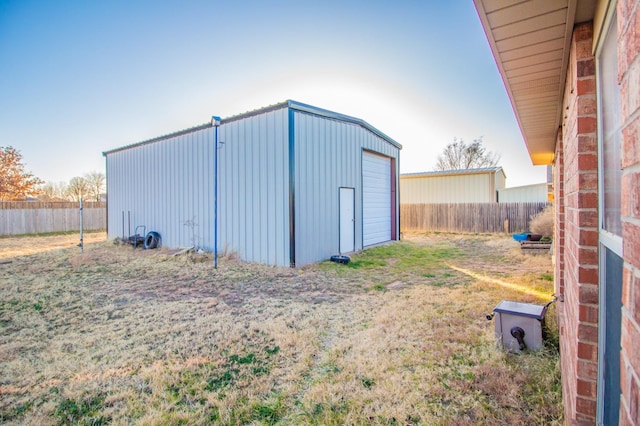 view of outdoor structure with a garage