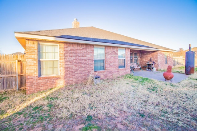 rear view of house featuring a patio area