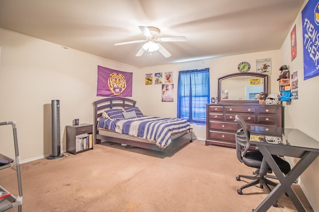 bedroom with ceiling fan and carpet