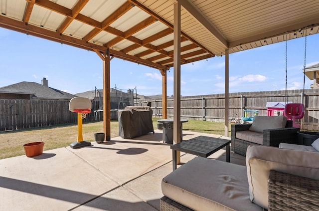 view of patio / terrace featuring an outdoor living space, a grill, and a trampoline